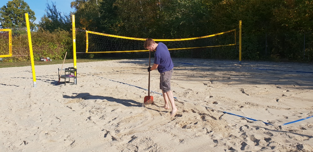 Sand schaufeln